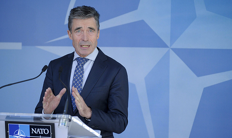 NATO Secretary-General Anders Fogh Rasmussen holds a news conference at the Alliance's headquarters in Brussels on Wednesday. Photo: Reuters