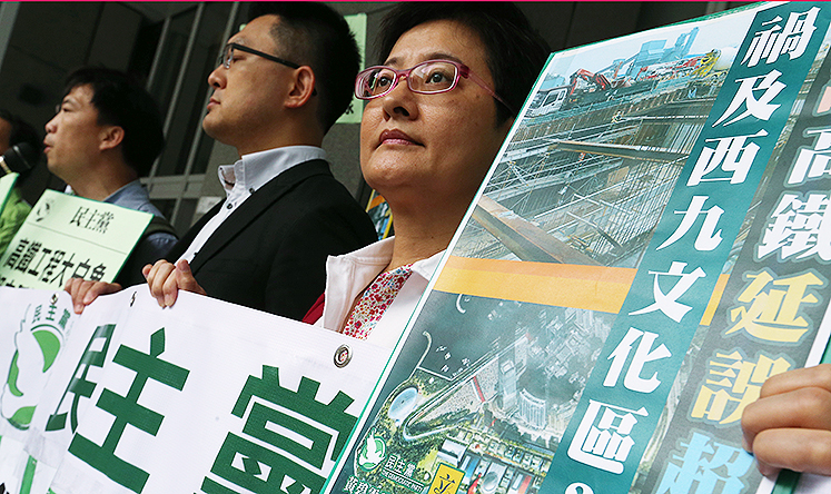 Legislator Wu Chi-wai (left), Helena Wong Pik-wan (right) and members of the Democratic Party demand that the government release all documents relating to the delay in the Express Rail Link project at Legco Building in Tamar. Photo: K. Y. Cheng