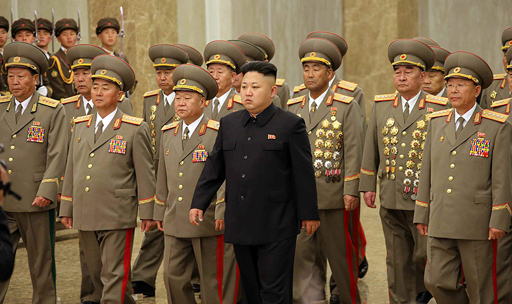 North Korean leader Kim Jong-un (centre) with military leaders in Pyongyang. Photo: EPA