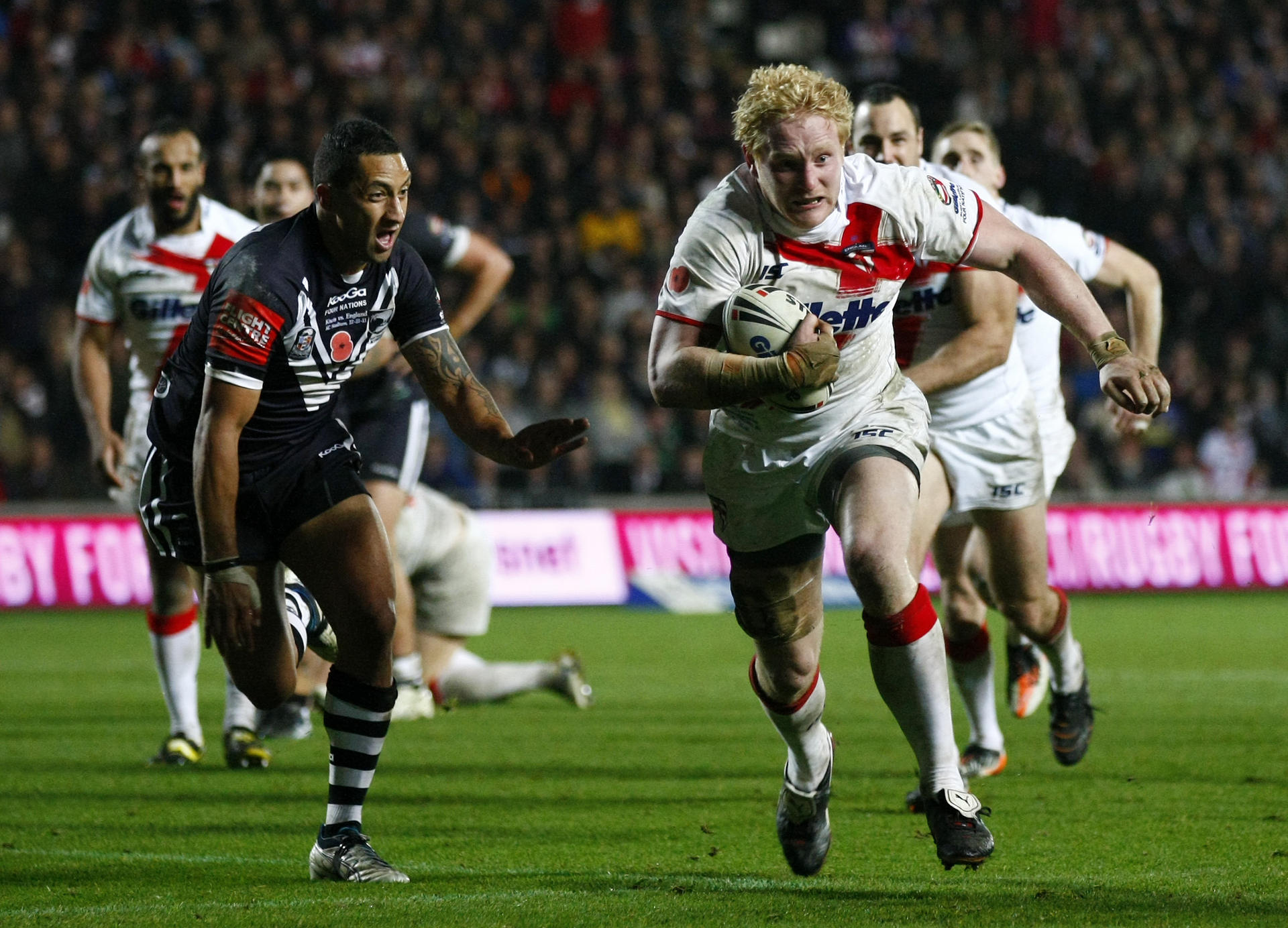 Benji Marshall chases England's James Graham during a Four Nations rugby league test match at Hull in England. Marshall switched to rugby union with the Auckland Blues but it has not worked out. Photo: AP