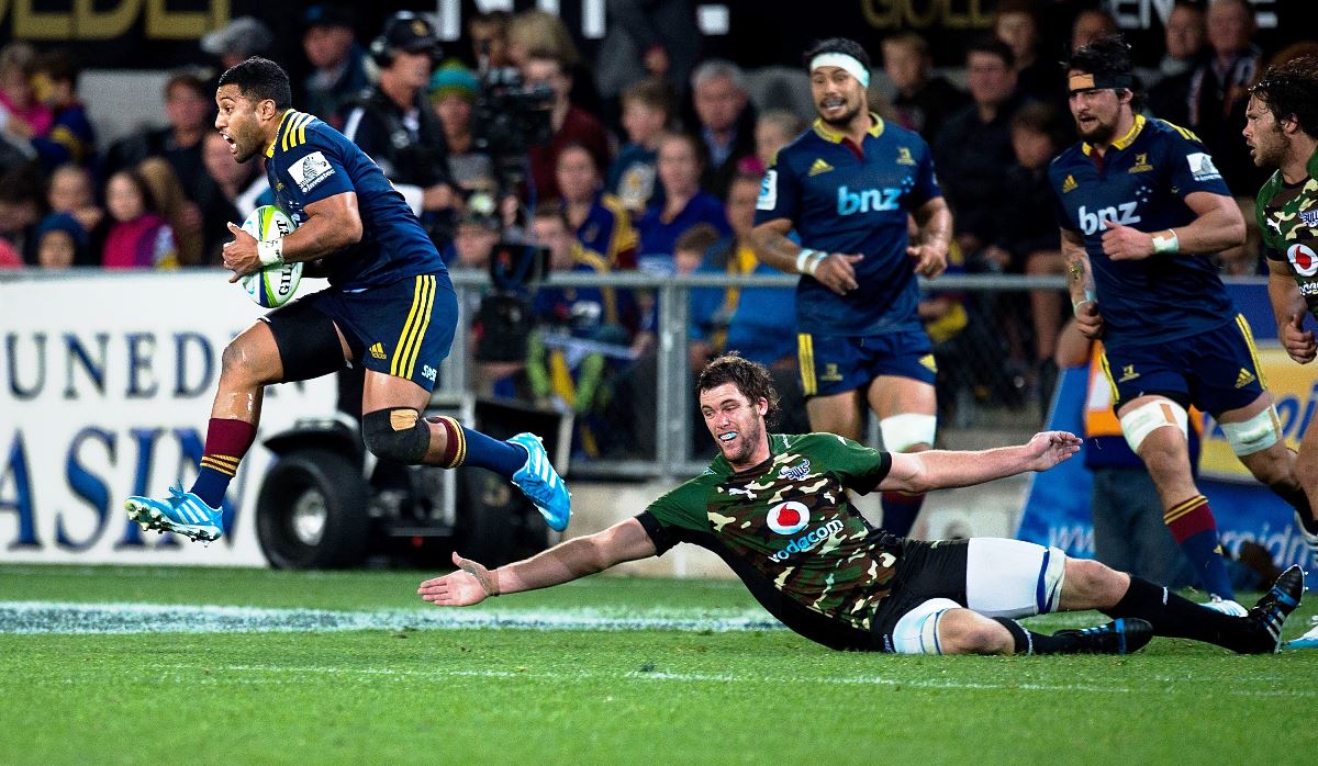 Highlanders fly-half Lima Sopoaga, shown here slipping the Bulls defence during a recent game in Dunedin, didn’t miss a shot at goal against the Sharks in Durban. Photo: AFP