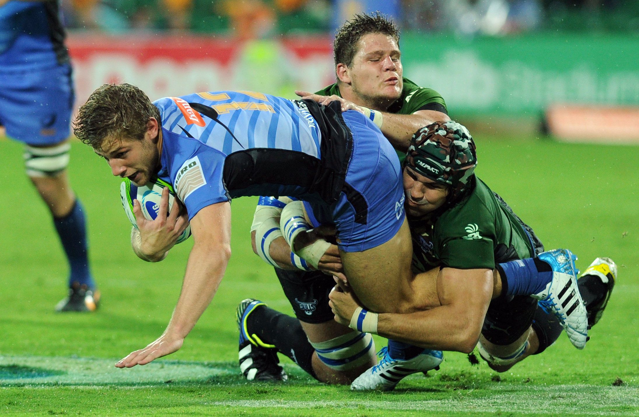 The Western Force's Kyle Goodwin is brought down in a tackle during the match against the Bulls in Perth. Photo: AFP