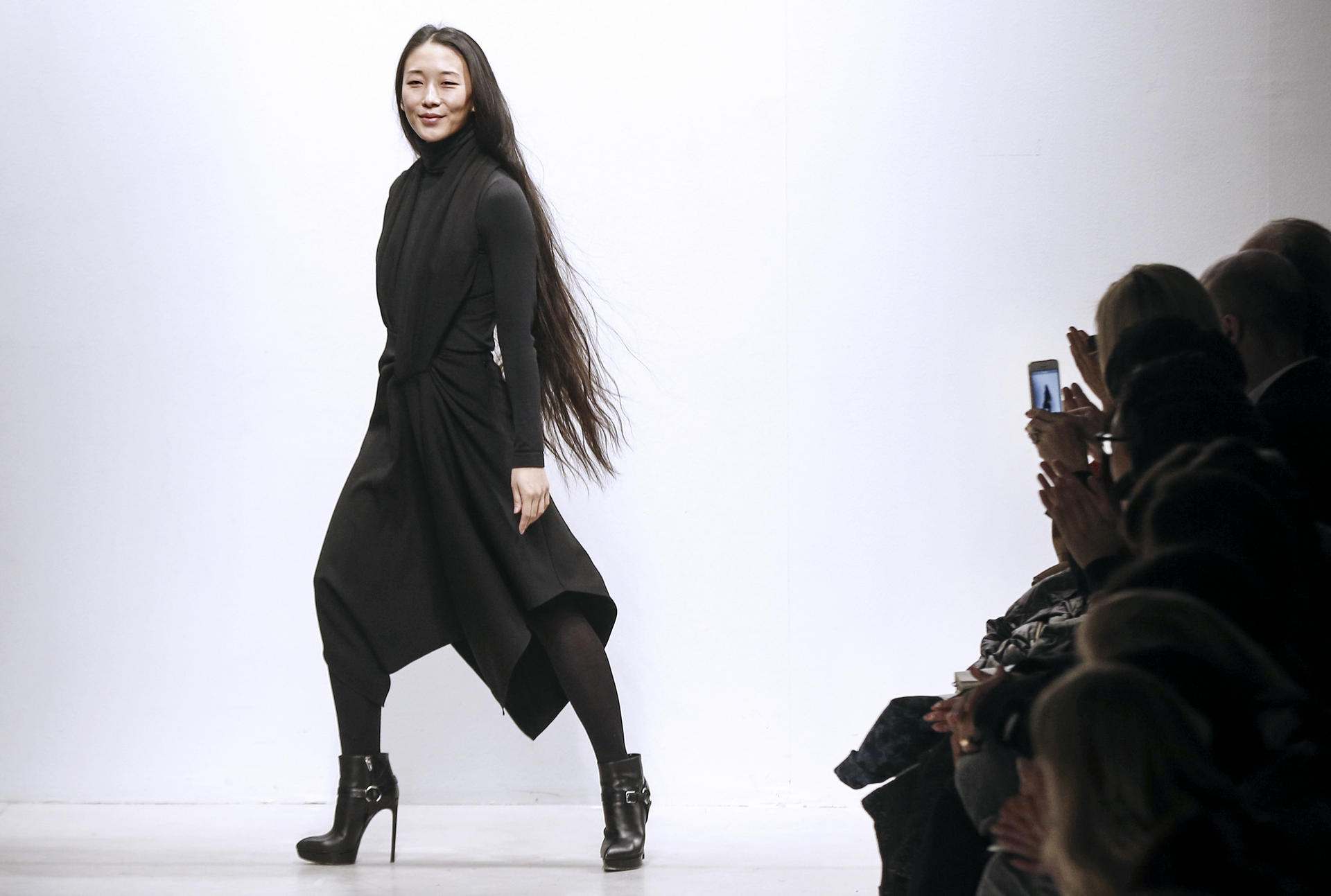 Yiqing Yin takes a bow at the end of the Léonard autumn-winter ready-to-wear collection fashion show in March. Photos: AFP