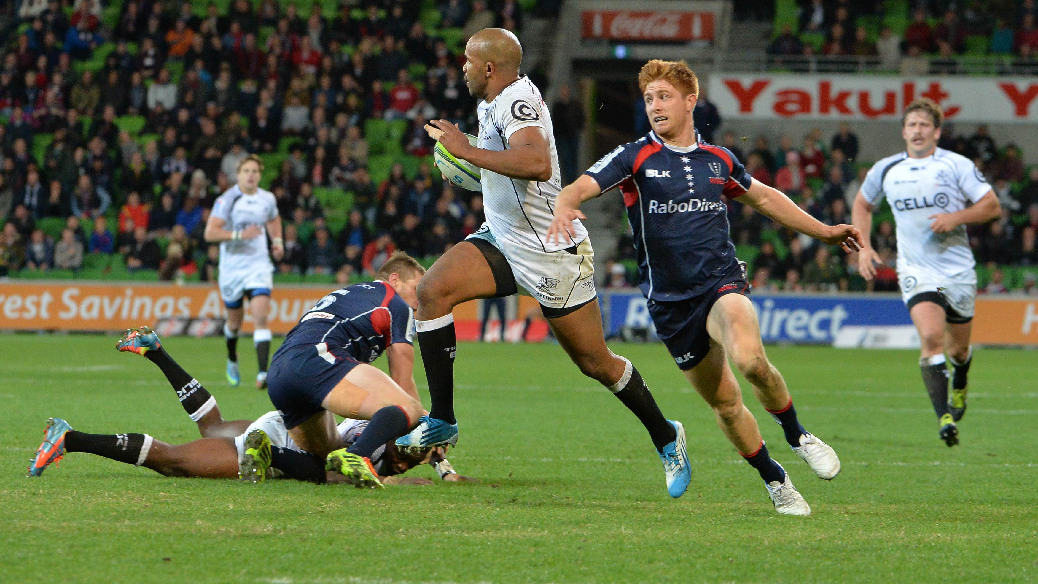 Sharks winger JP Pietersen makes a break for the try line in their match against the Rebels in Melbourne. Photo: AFP