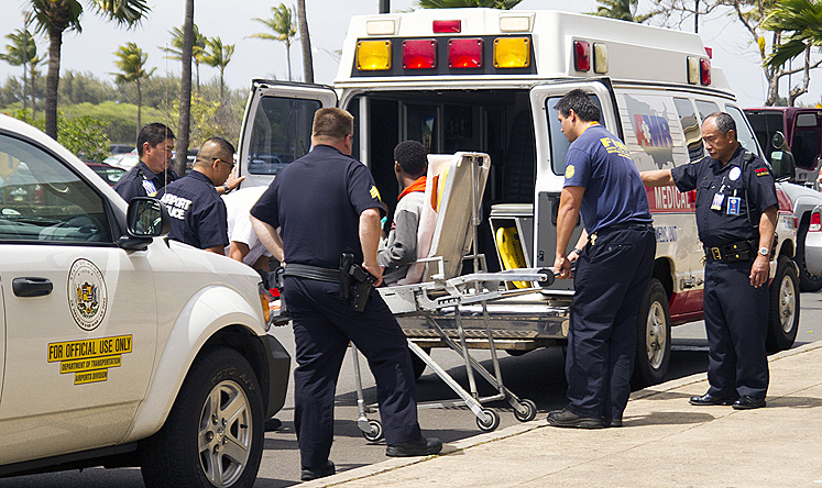 Teenage Somali-immigrant Yahya Abdi is loaded into an ambulance at Kahului Airport in Maui, Hawaii after he endured a flight in the jet's wheel well. Photo: AP
