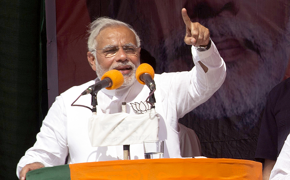 India’s main opposition and Hindu nationalist Bharatiya Janata Party  prime ministerial candidate Narendra Modi addresses an election rally on Saturday. Photo: AP 