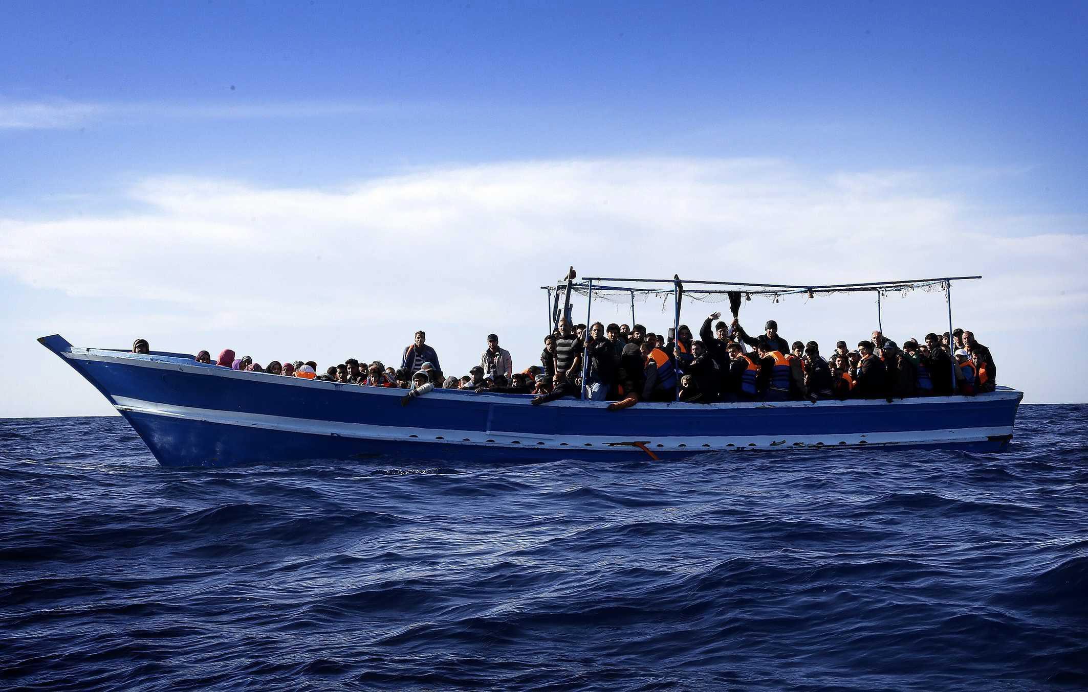 Hundreds of migrants have been landing in Italy on an almost daily basis in recent weeks, many of them now being picked up on Italian warships. Photo: EPA