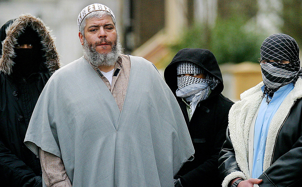 File picture of muslim cleric Abu Hamza surrounded by supporters outside the North London Mosque at Finsbury Park in 2003. Photo: Reuters