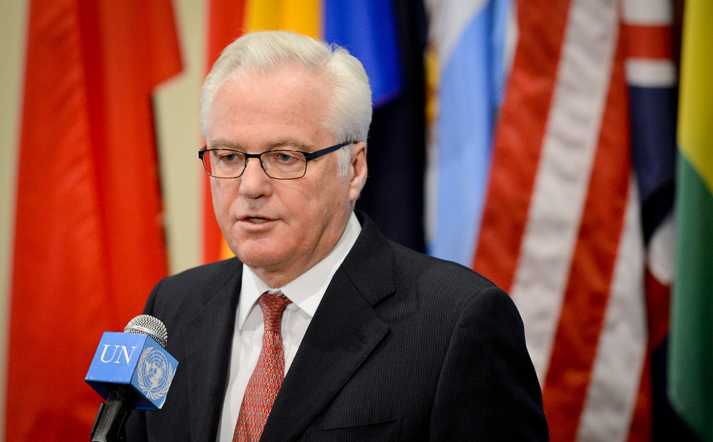 Vitaly Churkin, Russia's permanent representative at the UN, addresses reporters at the end of closed council consultations in New York on Monday. Photo: Xinhua