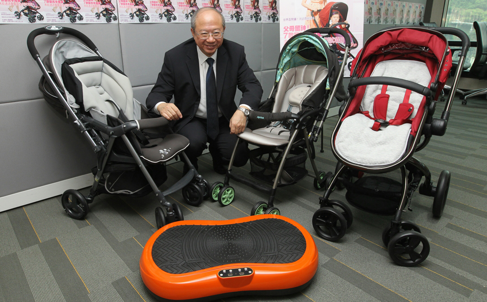 Michael Hui King-man of the Consumer Council with some of baby strollers tested. Photo: Edward Wong
