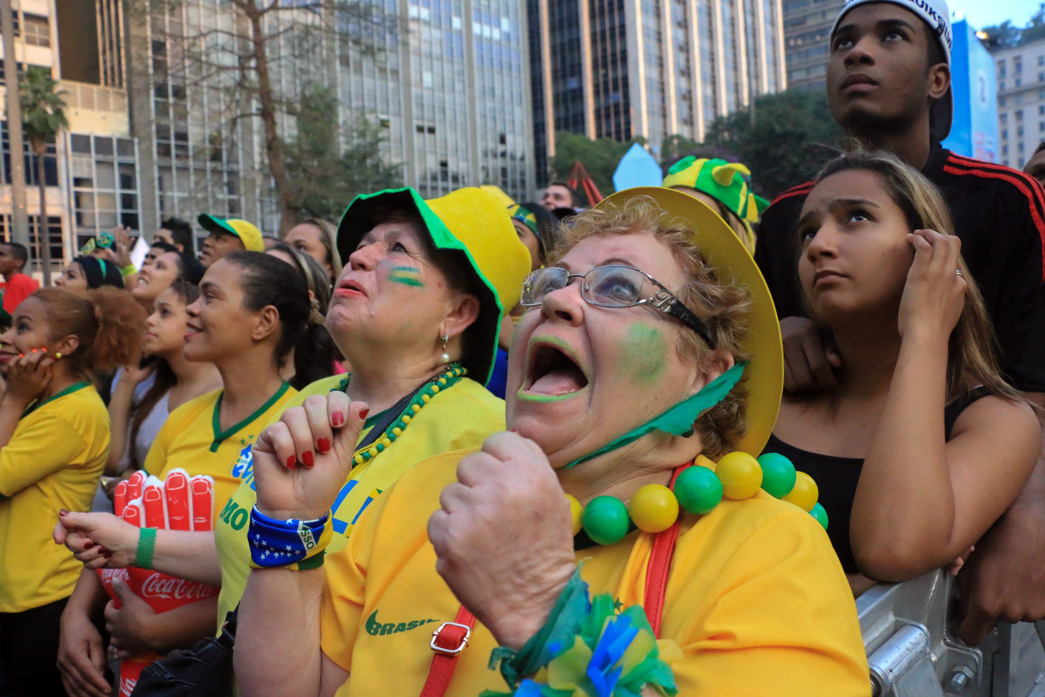 Fans watch Brazil play Mexico in Sao Paulo on Tuesday. Photo: AP