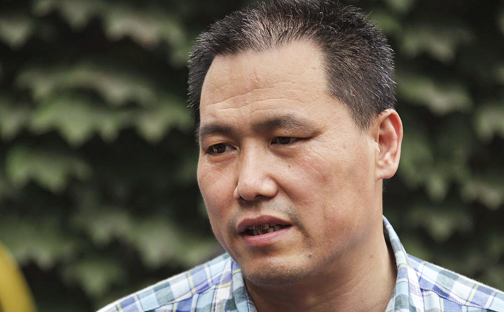 Lawyer Pu Zhiqiang was arrested after an online campaign to abolish labour camps.
