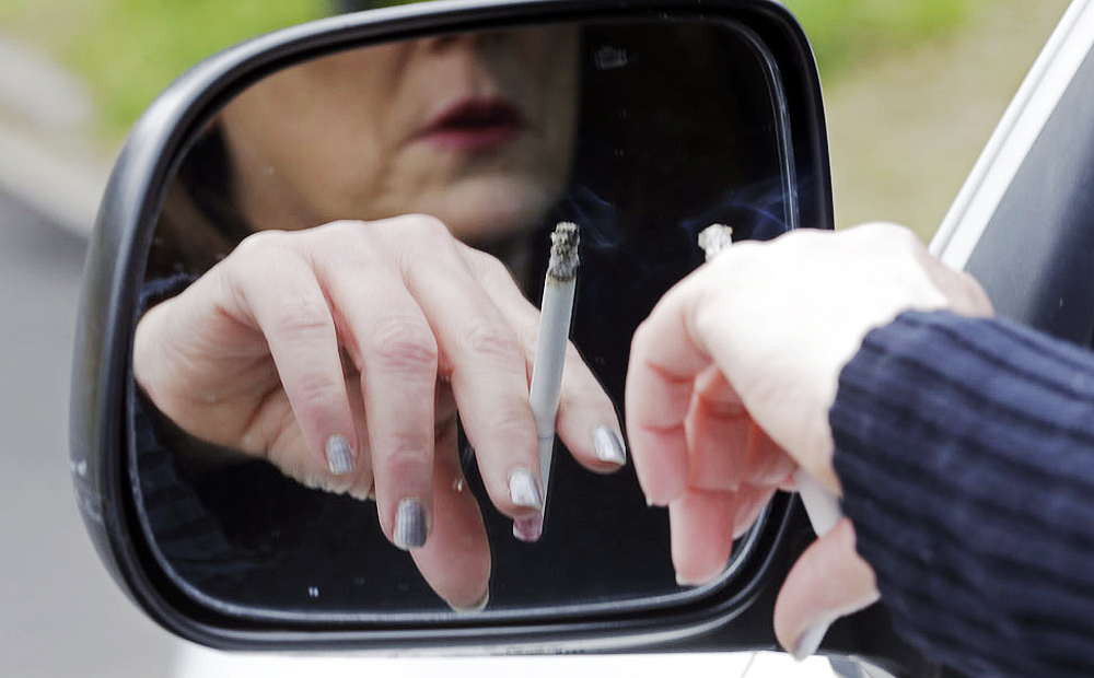 Stress, sadness, boredom and peer pressure were some of the psychological reasons for smoking cited by women in the survey carried out by Dr William Li Ho-cheung, of the University of Hong Kong's School of Nursing. Photo: AP