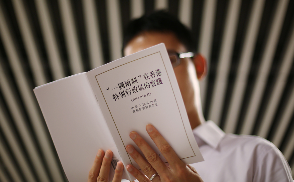 The "One-Country, Two-Systems" policy is available at bookstores. Photo: Nora Tam