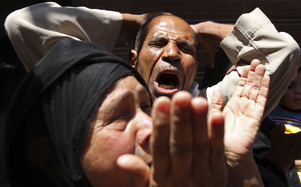 Relatives of members of the Muslim Brotherhood and supporters of ousted Egyptian President Mursi react to the death sentences outside a court in Minya, south of Cairo. Photo: Reuters