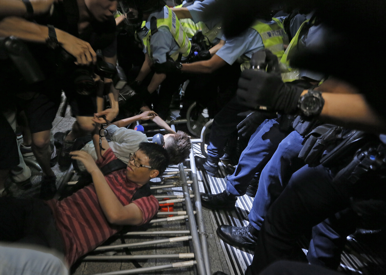 Protesters against new town development in the New Territories clash with police outside the Legislative Council building earlier this month. Photo: AP