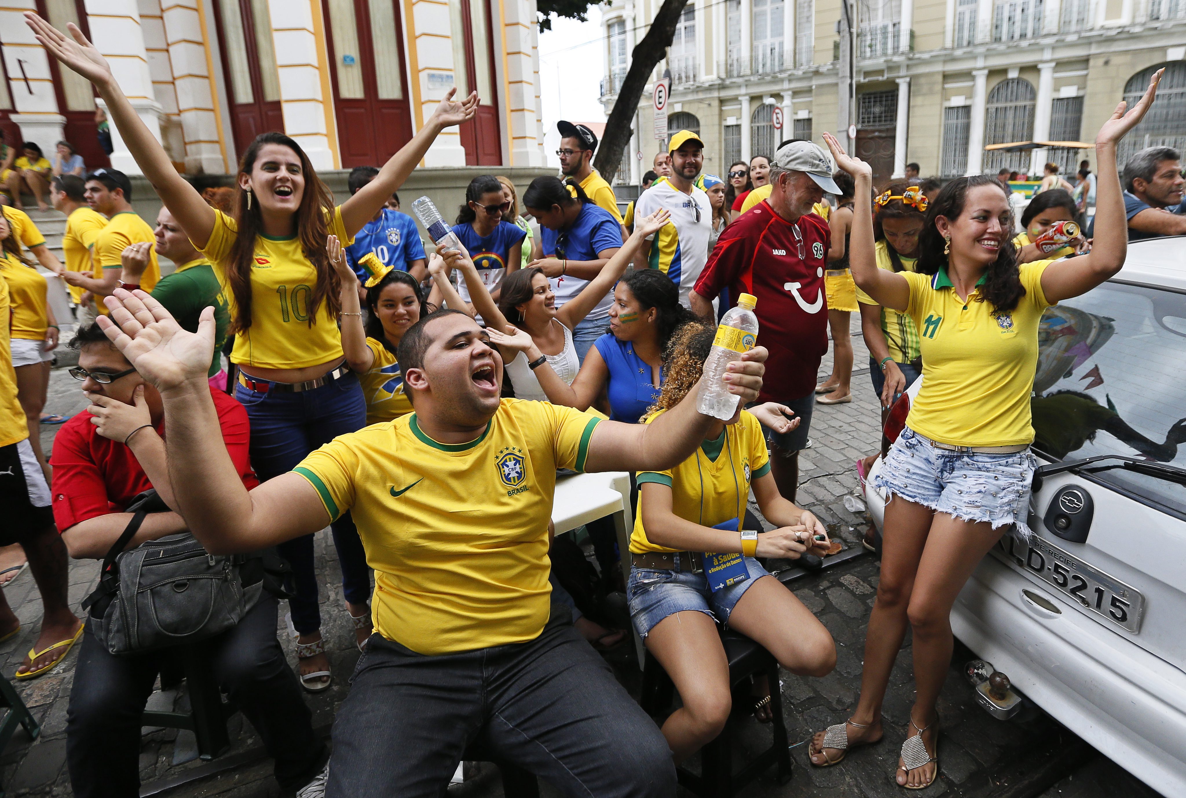 Brazil fans party on the streets of Recife after their team beat Chile on penalties. Photo: AP