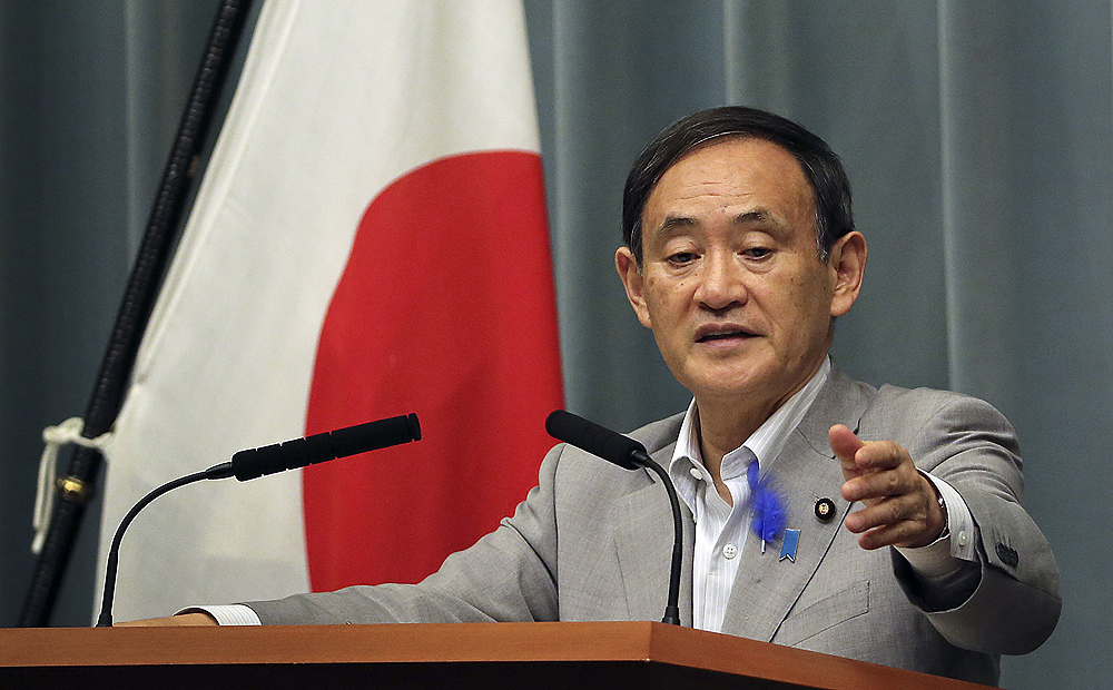 Japan's Chief Cabinet Secretary Yoshihide Suga denies press reportes taht North Korea has provided Tokyo with a list of abductees during a press conference in Tokyo on Friday. Photo: AP