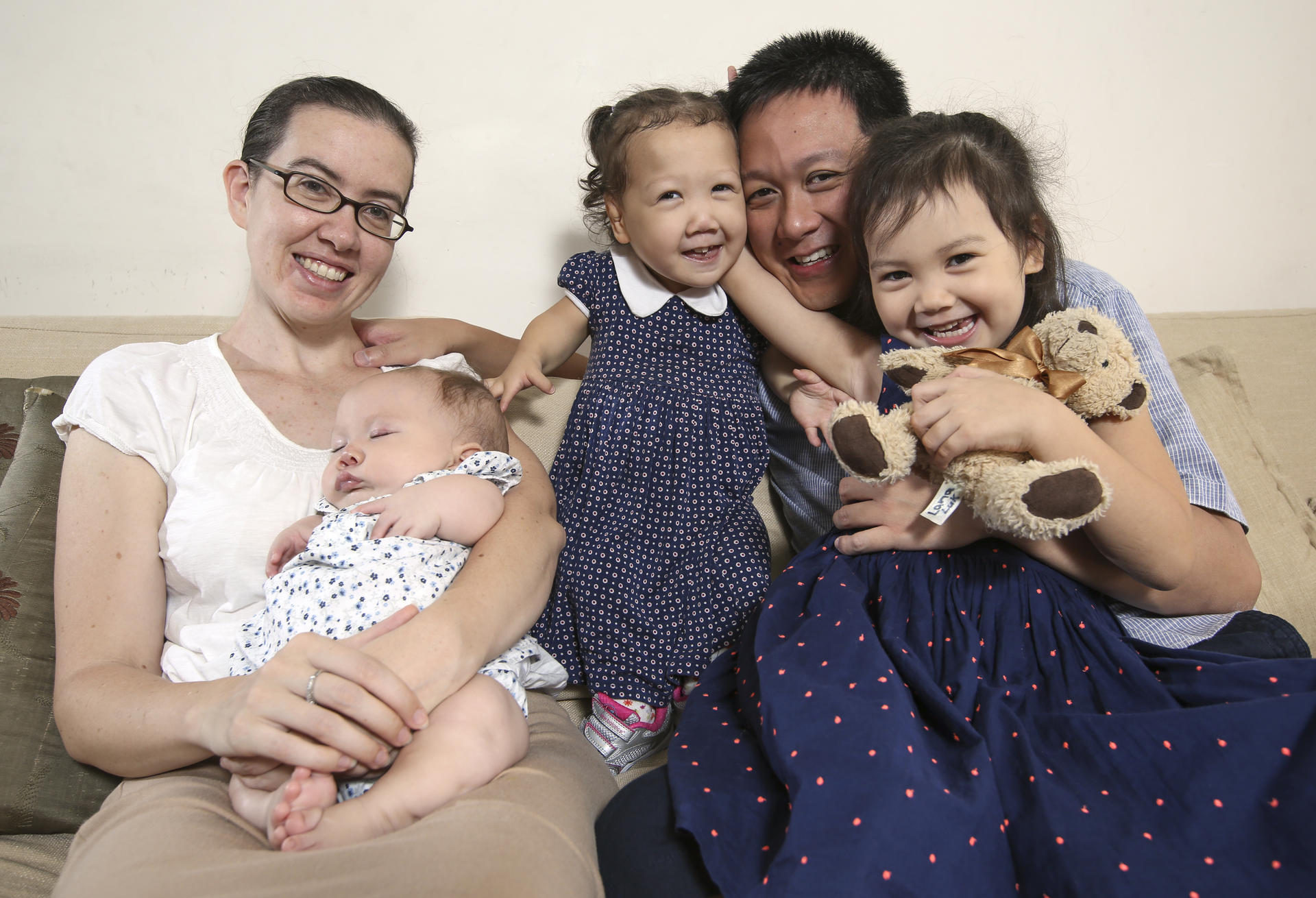 Nicole and Bernard Luk with daughters Briella, Maddy and Lana. Photo: Sam Tsang