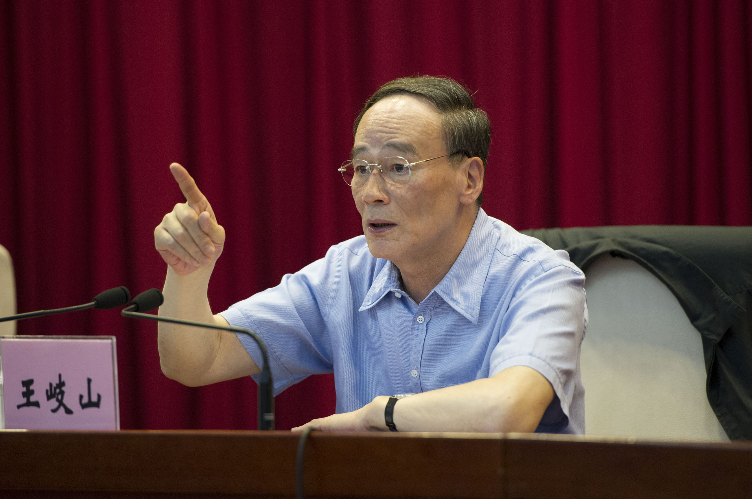 Wang Qishan, secretary of the CCDI, said inspectors could investigate any place, department, enterprise or sector where they suspected severe graft. Photo: Xinhua