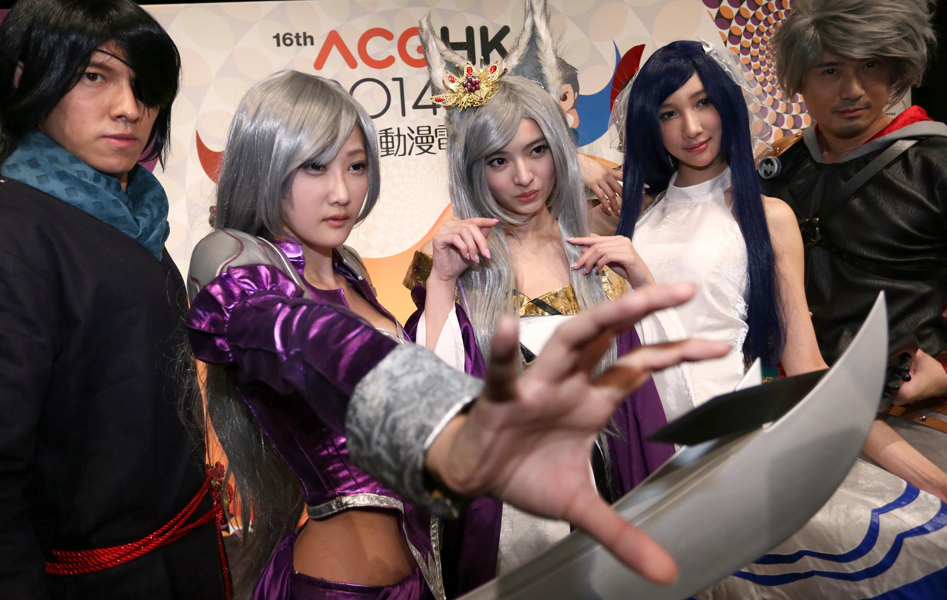 More than 730,000 are expected to attend, many dressed as characters such as these from the gameTower of Saviours. Photo: Nora Tam