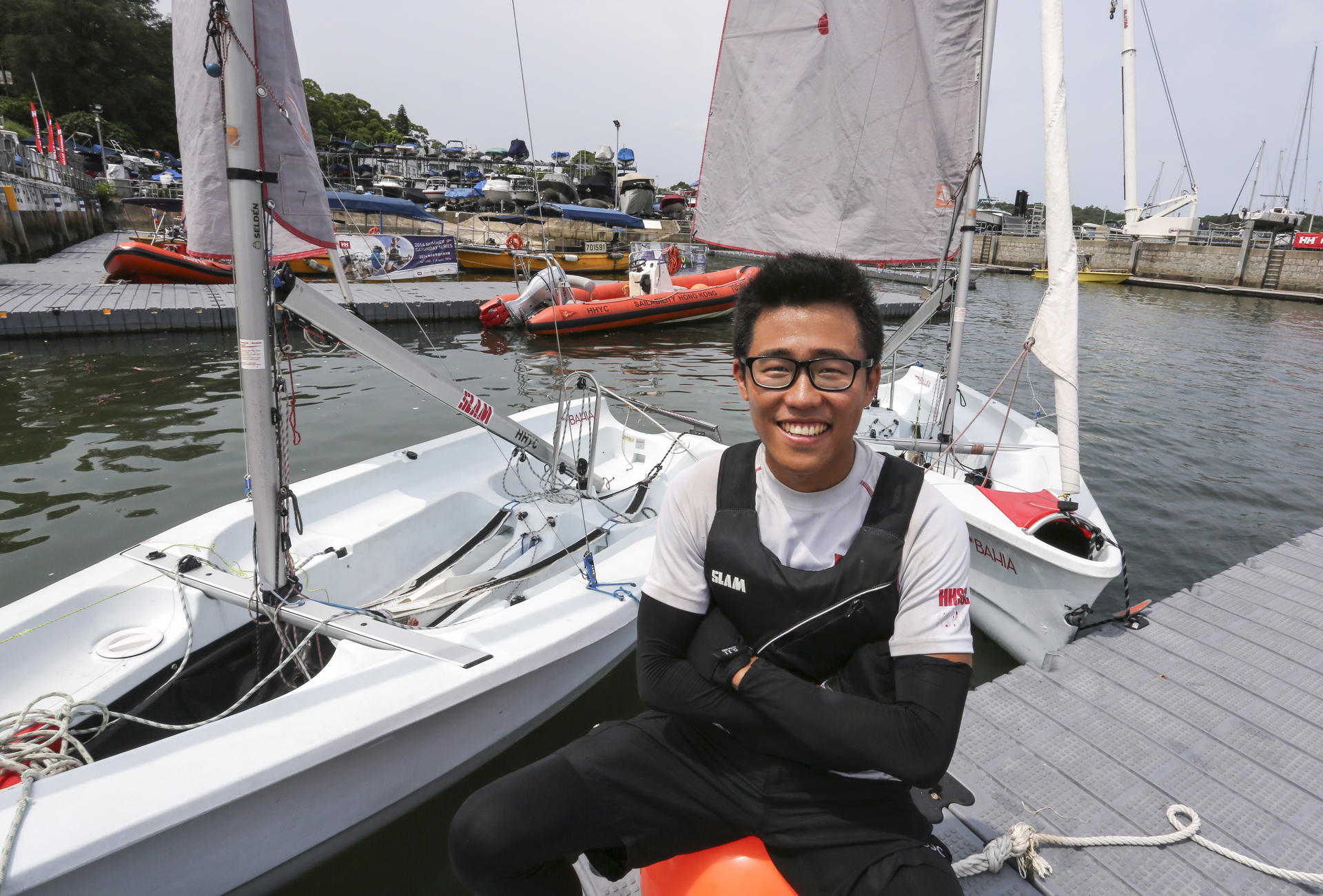 South Korean Luke Yun is enjoying his job as an assistant sailing instructor at Hebe Haven Yacht Club in Sai Kung. Photo: Jonathan Wong