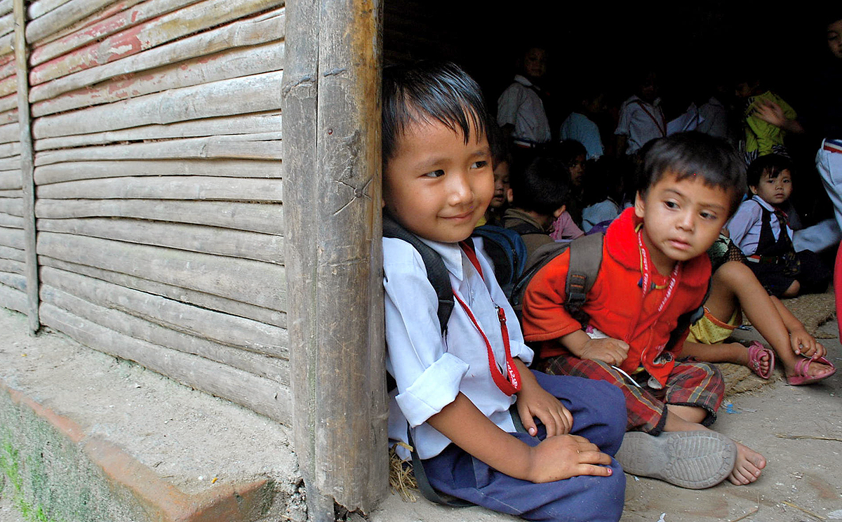 Young children attend a bamboo school in Kathmandu, Nepal. What started as cheap alternative schooling has expanded to 19 districts. Photo: Bibek Bhandari