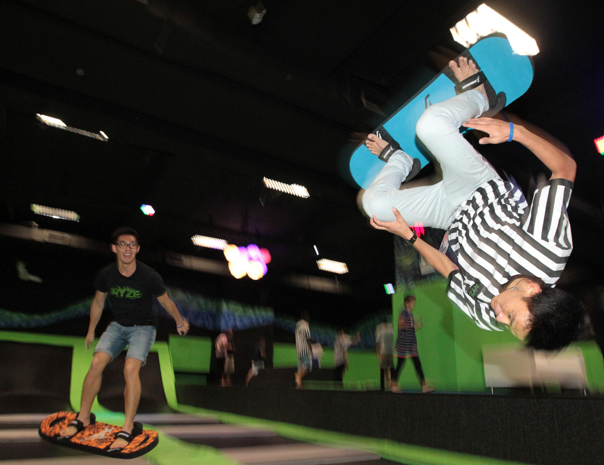 Young Hongkongers try some moves at Ryze, a trampoline park in Quarry Bay that is becoming quite a hot spot. Photo: Bruce Yan
