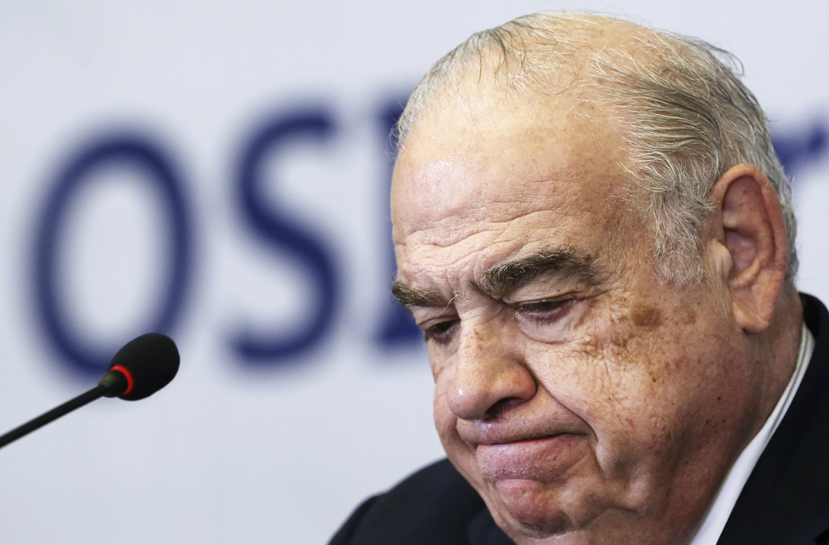 OSI Group Chairman and CEO Sheldon Lavin attends a news conference in Shanghai, July 28, 2014. Photo: Reuters