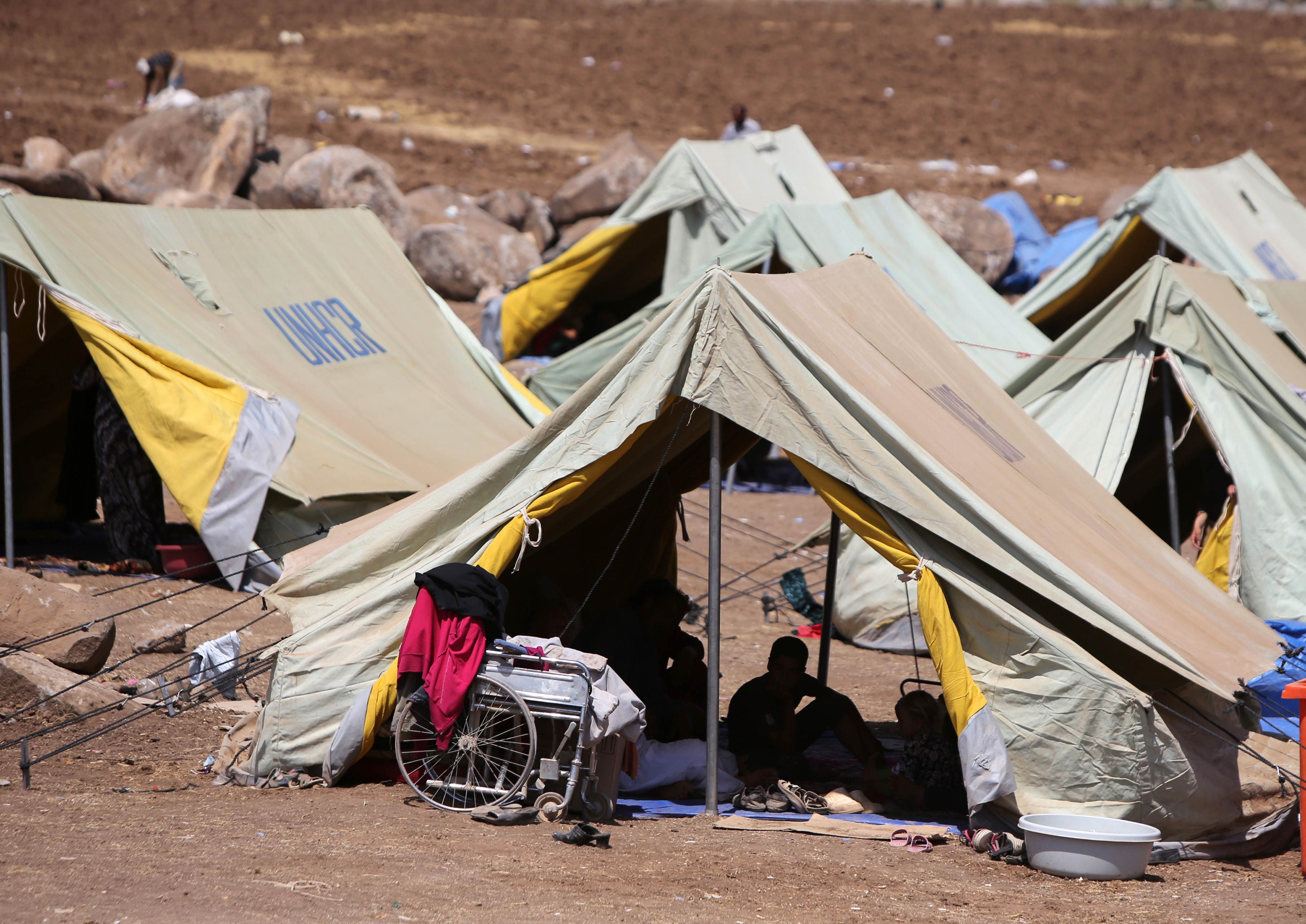 Displaced Iraqis settle in at a camp in northeastern Syria, after fleeing Islamic State militants in Iraq. Photo: AFP
