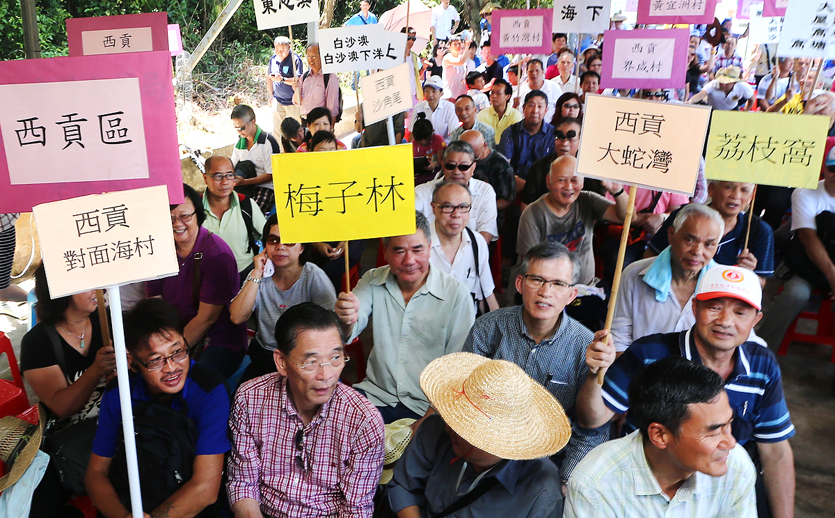Residents of the north Lantau villages of Pak Mong, Tai Ho and Ngau Kwu Long protest against a new zoning plan that would protect 4.6 hectares of land in the 230-hectare Tai Ho valley and estuary as a site of special scientific interest. Photo: David Wong