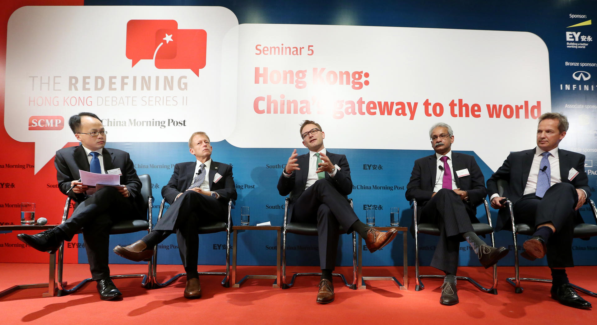 From left, the Post's William Zheng, EY's Bob Partridge, Ian Bolin from Infiniti, Digital Realty's Kris Kumar and Cathay Pacific's Rupert Hogg discuss the problems facing Hong Kong. Photo: Sam Tsang