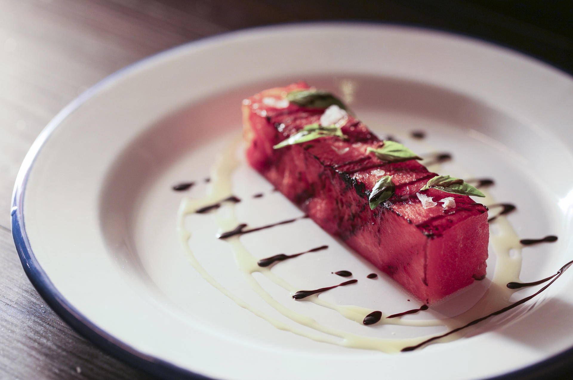 Grilled watermelon steak with charred flavour at Risi e Bisi