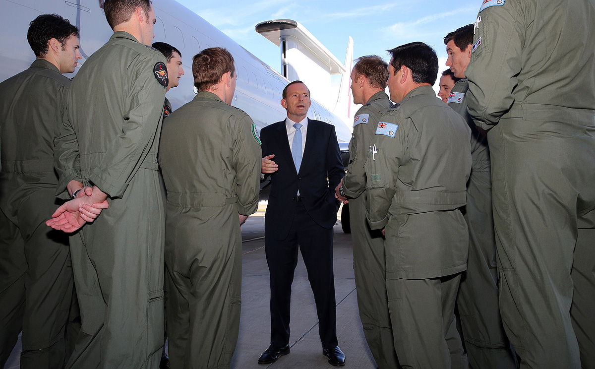 Australia's Prime Minister Tony Abbott (centre) bidding farewell to Australian troops deploying to the United Arab Emirates from RAAF Base Williamtown near Newcastle. Photo: AFP