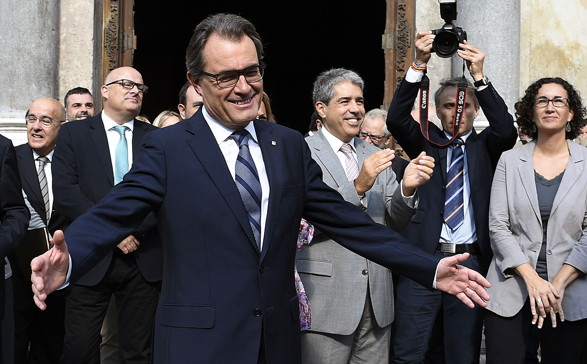 President of Catalonia's regional government Artur Mas gestures after signing the regional law to vote on independence on Saturday. Photo: AFP