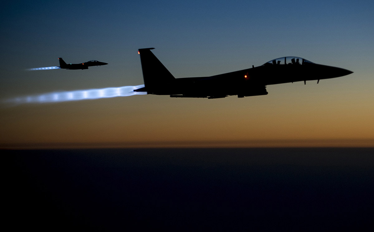 A pair of US Air Force F-15E Strike Eagles jet fighters fly over northern Iraq. Photo: Reuters