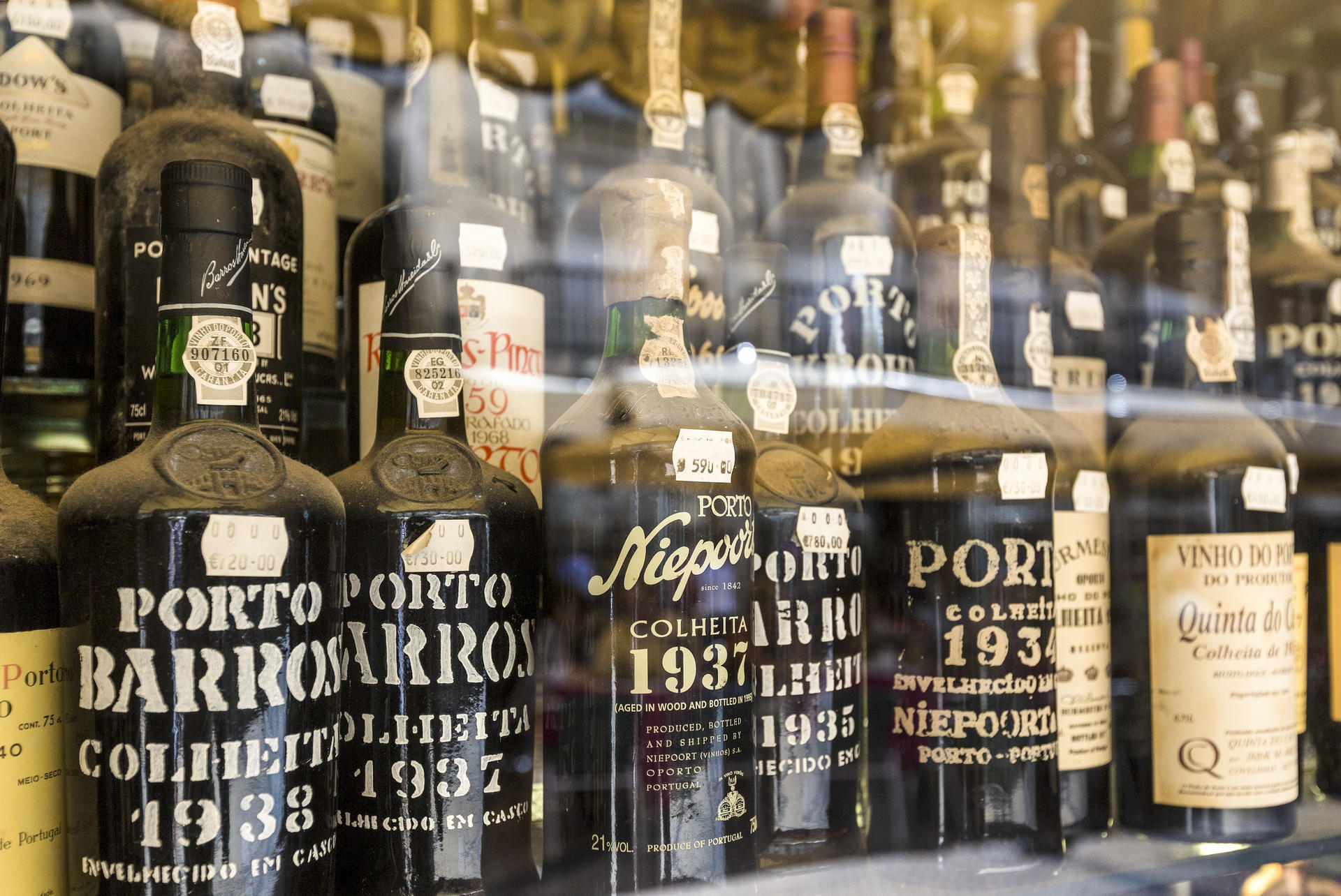 Bottles of vintage port in a window in Lisbon, Portugal. Photo: Corbis