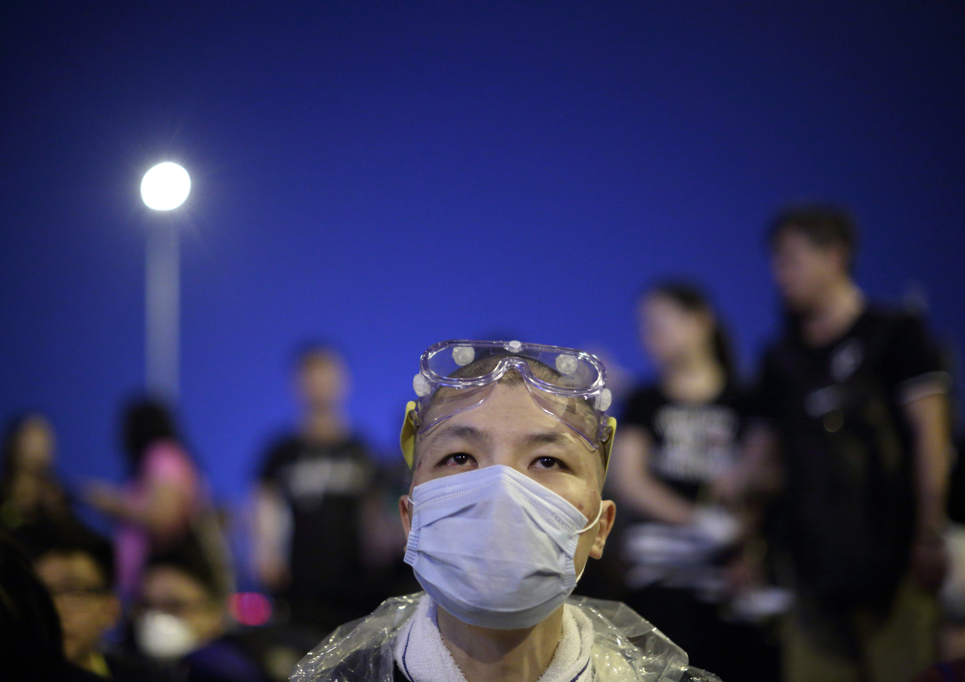 Whether or not Leung Chun-ying steps down, the students must not forget the goal of their protest. Photo: Bloomberg