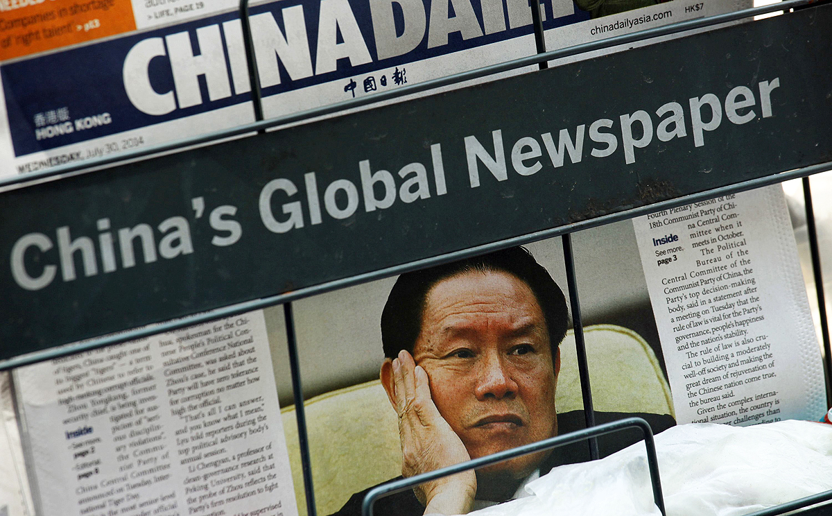 Former security chief Zhou Yongkang, under investigation for for possible “serious violations of party discipline” on the cover of China Daily. Photo: Reuters