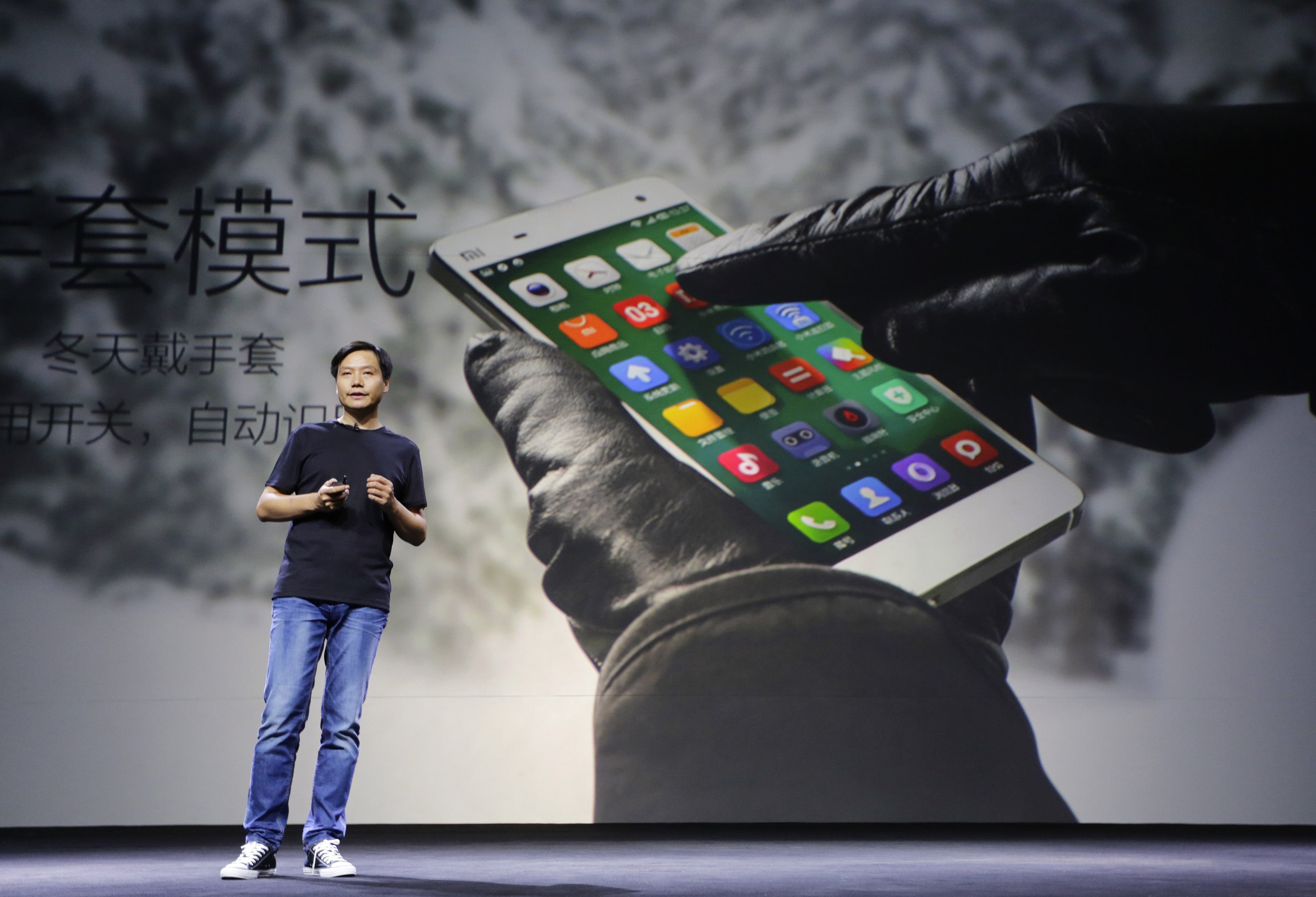 Lei Jun, CEO mobile company Xiaomi, introduces Xiaomi Phone 4 at a launching ceremony in Beijing. Photo: Reuters