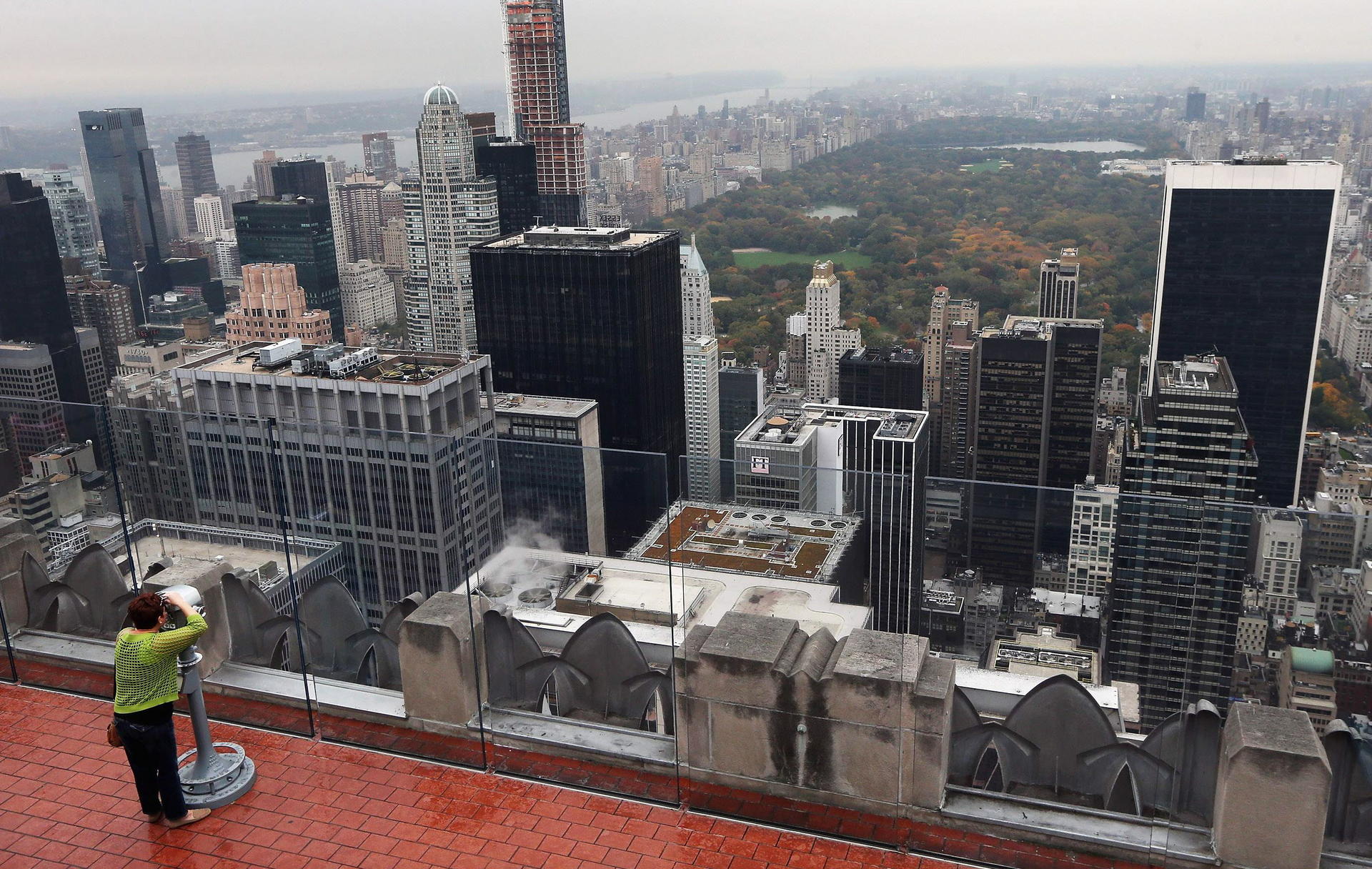 Buying property in countries such as the United States should no longer require approval. Photo: AFP