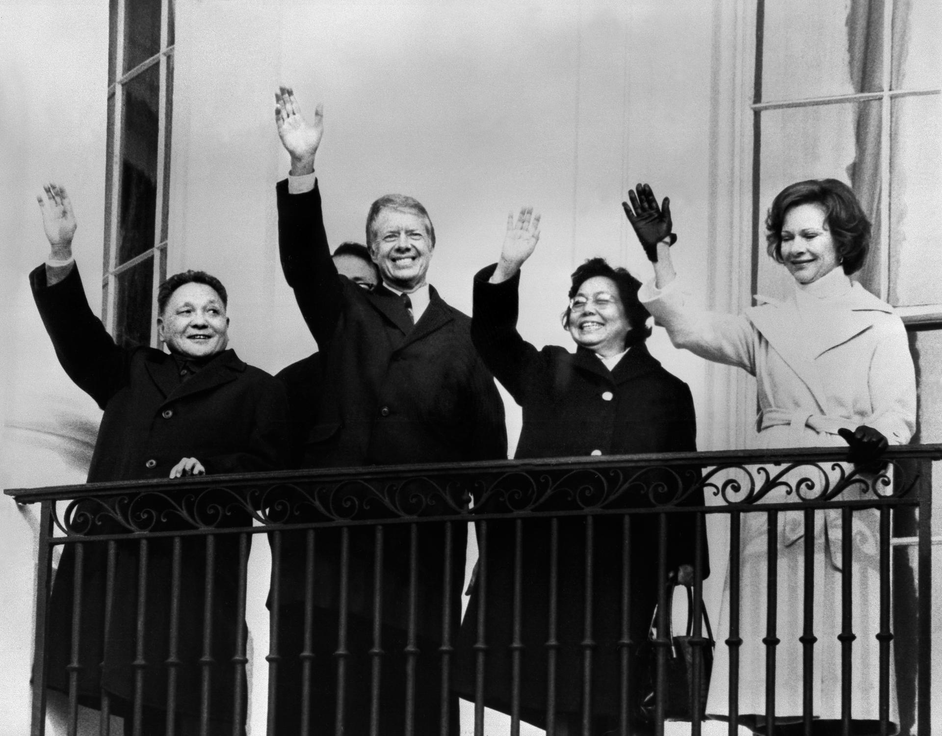 Deng Xiaoping and US president Jimmy Carter, with wives Zhuo Lin and Rosalynn Carter, wave from a balcony at the White House in 1979. Photo: AFP