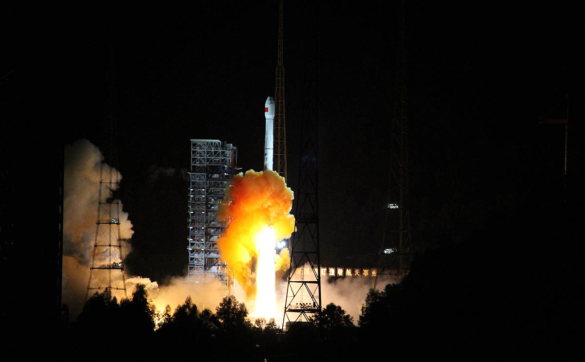 A rocket carrying the spacecraft launches from Xichang space base in  Southwest China on Friday. Photo: AFP