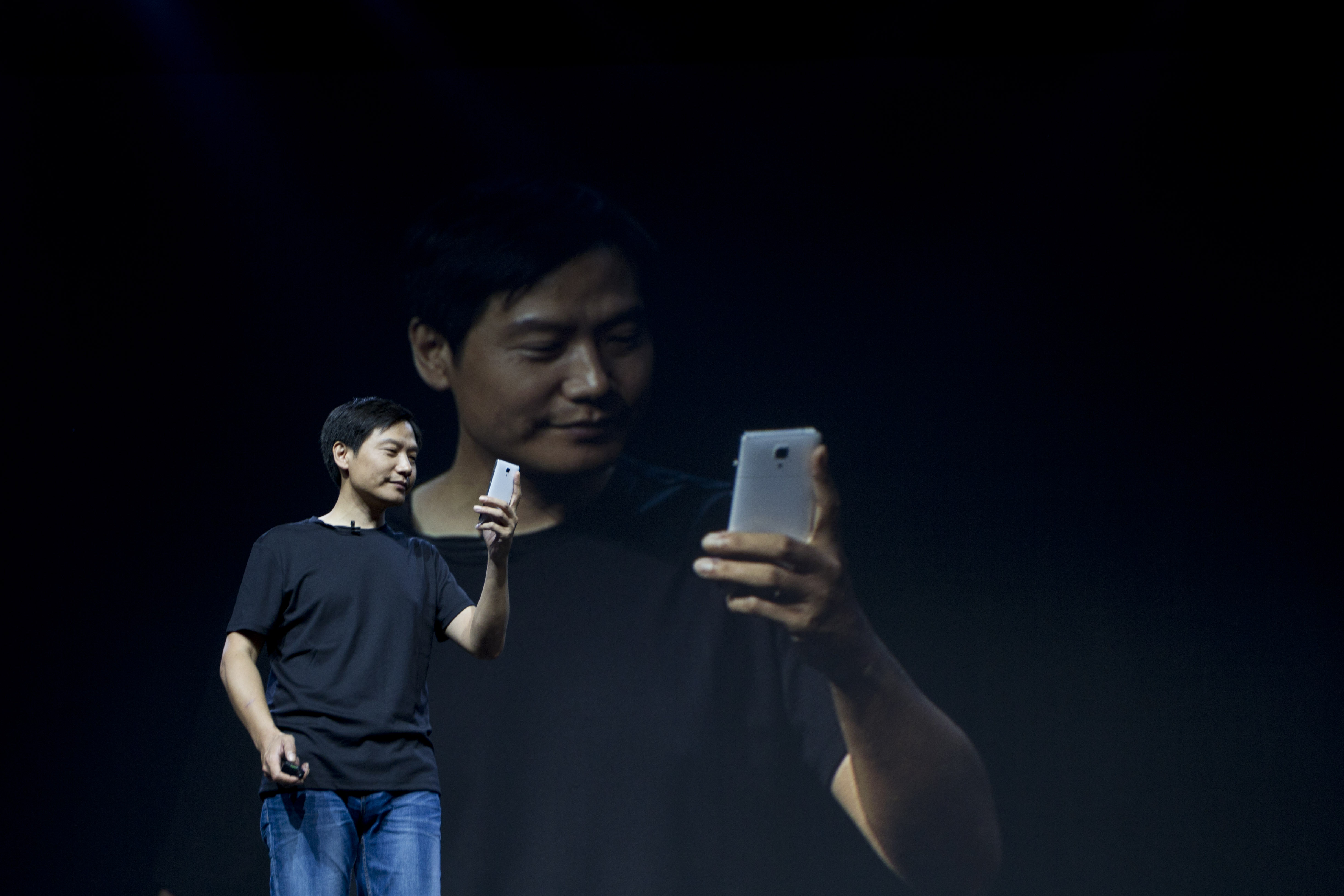 Lei Jun, CEO of Xiaomi launches the new Xiaomi 4 smart phone in Beijing. Photo: Simon Song 