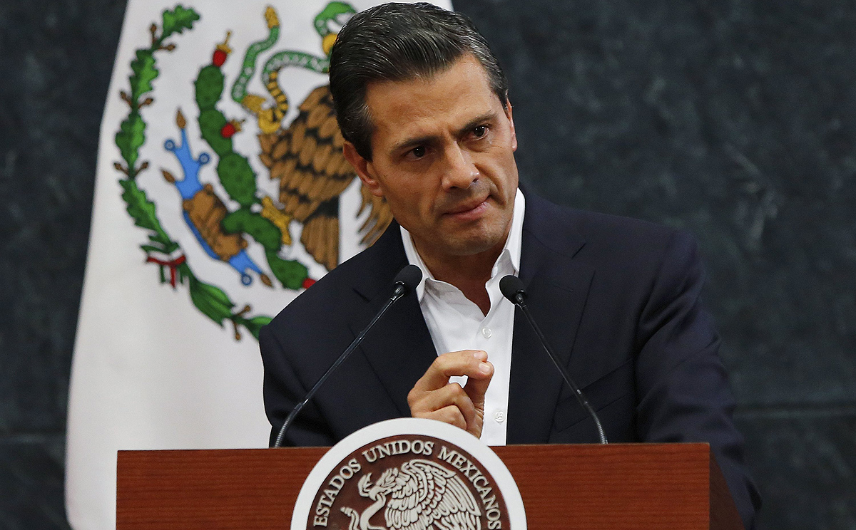 Mexico's President Enrique Pena Nieto addresses the media after meeting the relatives of the 43 missing students in Mexico City. Photo: Reuters