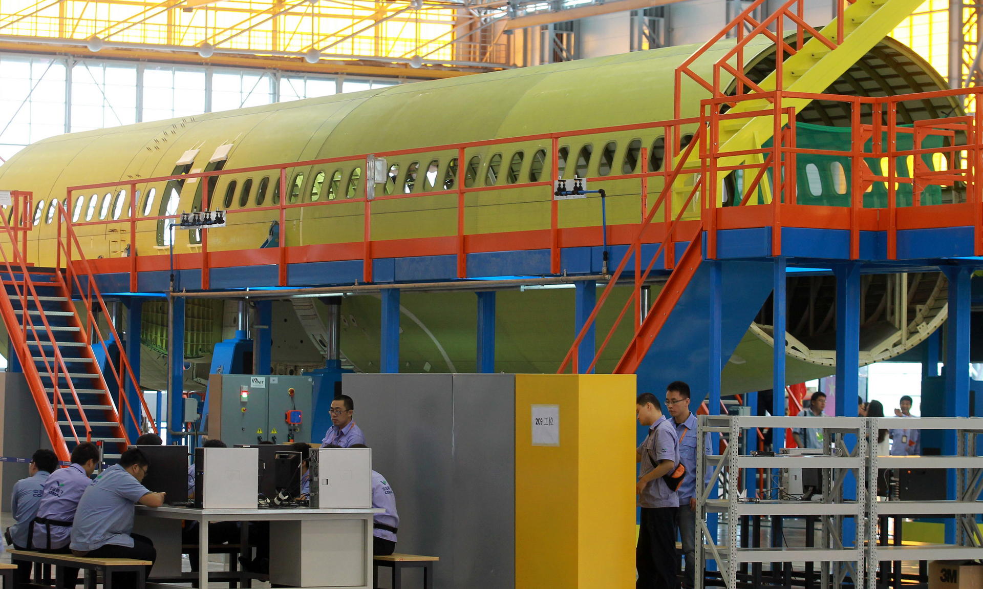 The C919 currently under development by Comac is a narrow-body version. The firm is now seeking suppliers to develop a widebody passenger plane. Photo: Xinhua