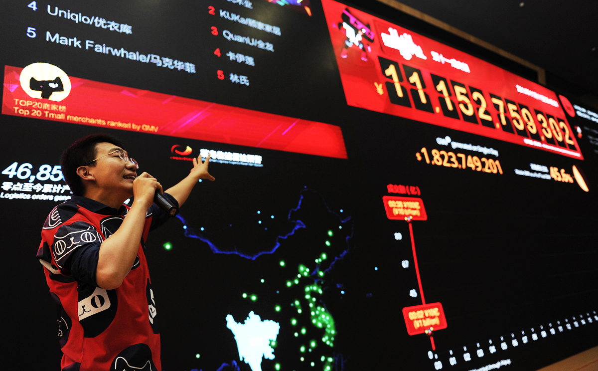 A large screen in Alibaba's headquarter in Hangzhou keeps updating the latest sales volume of Tmall, an online marketplace of the e-commerce giant. Photo: Xinhua