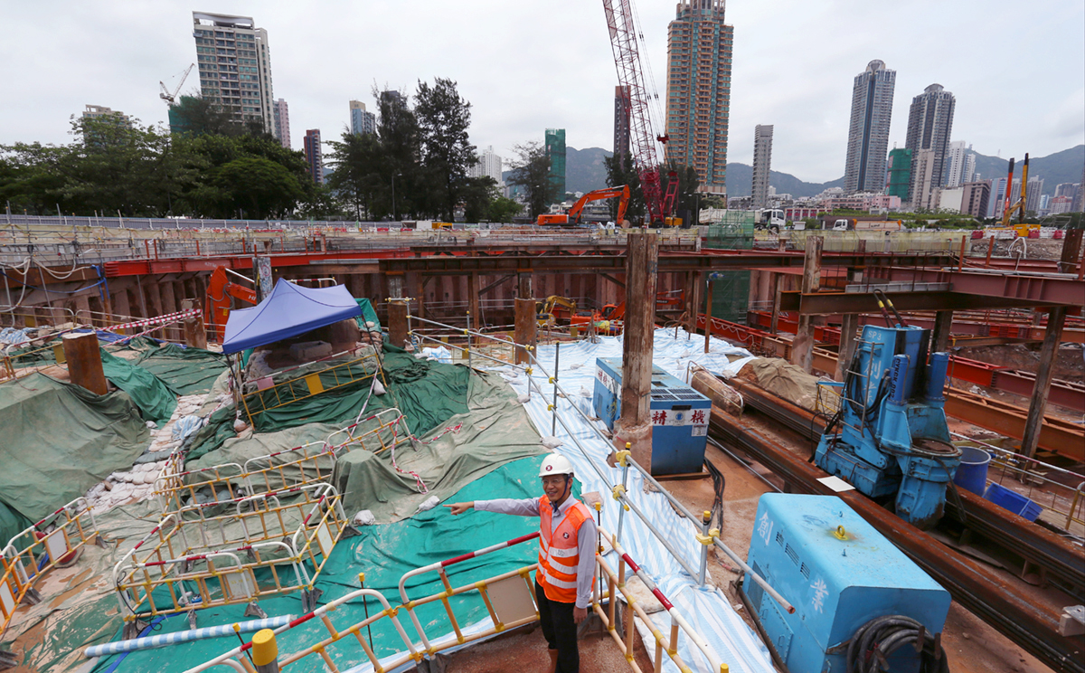 The To Kwa Wan MTR site where the discovery of relics - covered by canvas and the blue canopy - has led to delay. Photo: Nora Tam