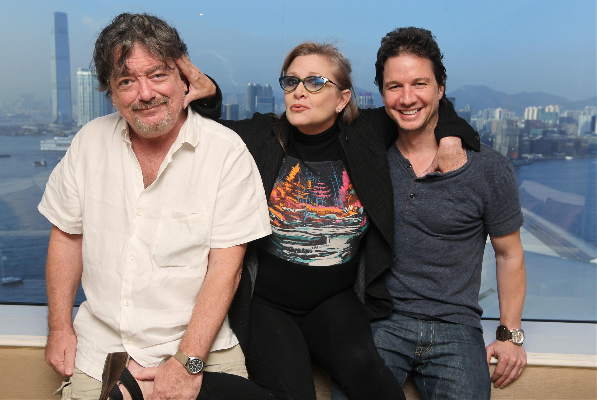 Charity fundraisers (from left) producer Charles Wessler, actress Carrie Fisher and Ivanhoe Pictures president John Penotti at the Grand Hyatt hotel. Photo: Edward Wong