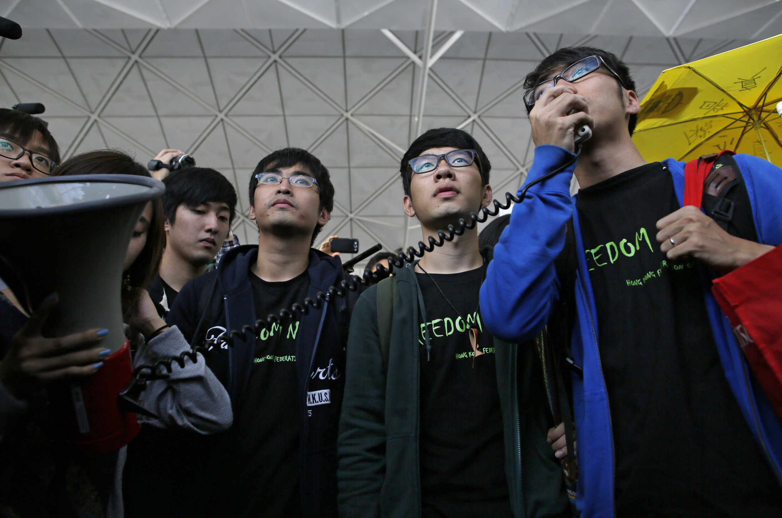 Student protest leaders were stopped by immigration officials at the Hong Kong airport from getting on a plane to Beijing. Photo: AP
